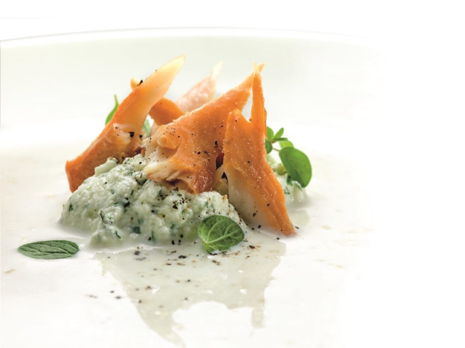 Milk soup with millet porridge smoked trout and herb
